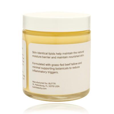 Jar of skincare product with a label on a white background